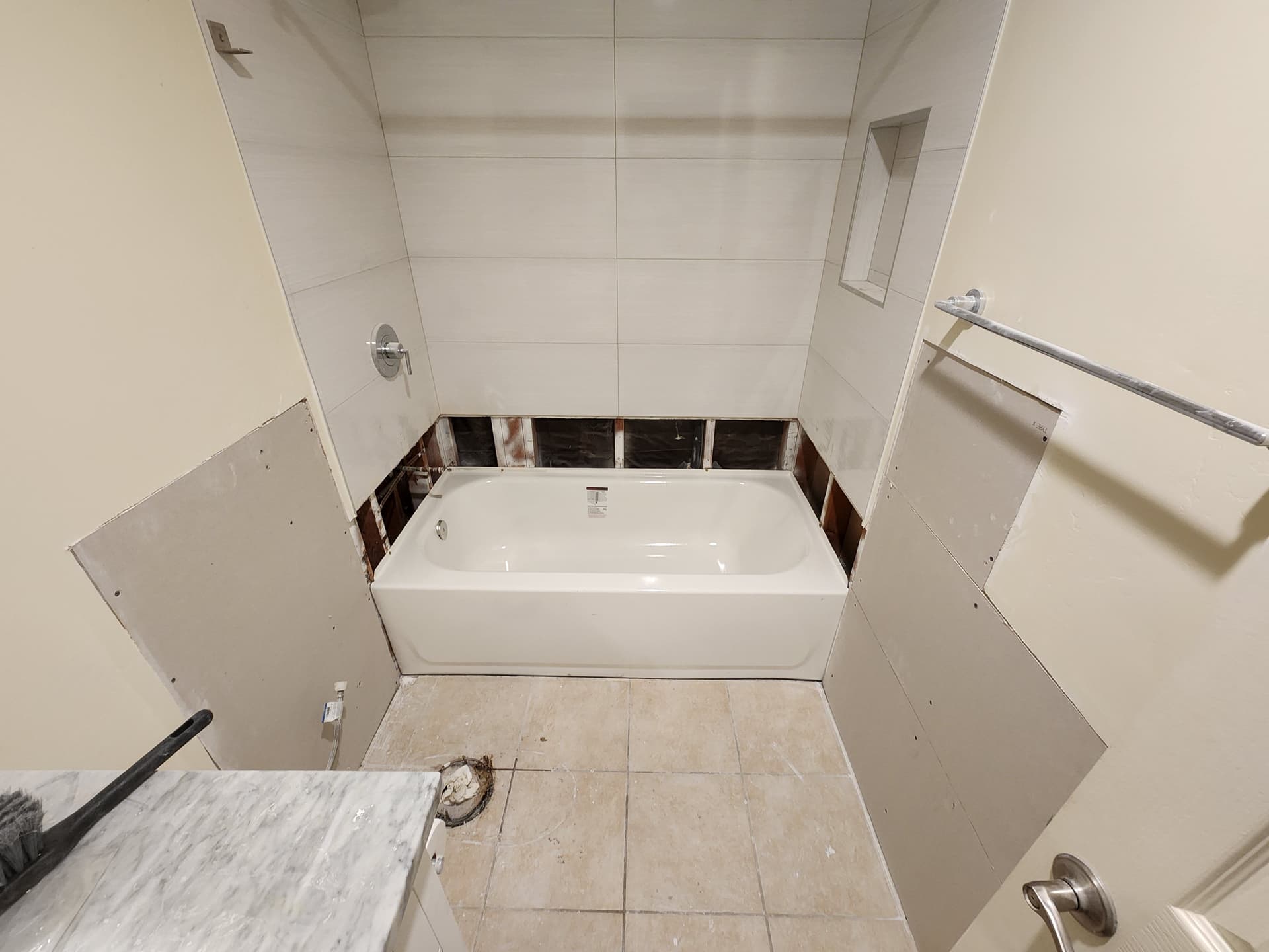 Gallery photos for Exposed Walls to Stunning Bathroom Remodel in Solana Beach: Image #1