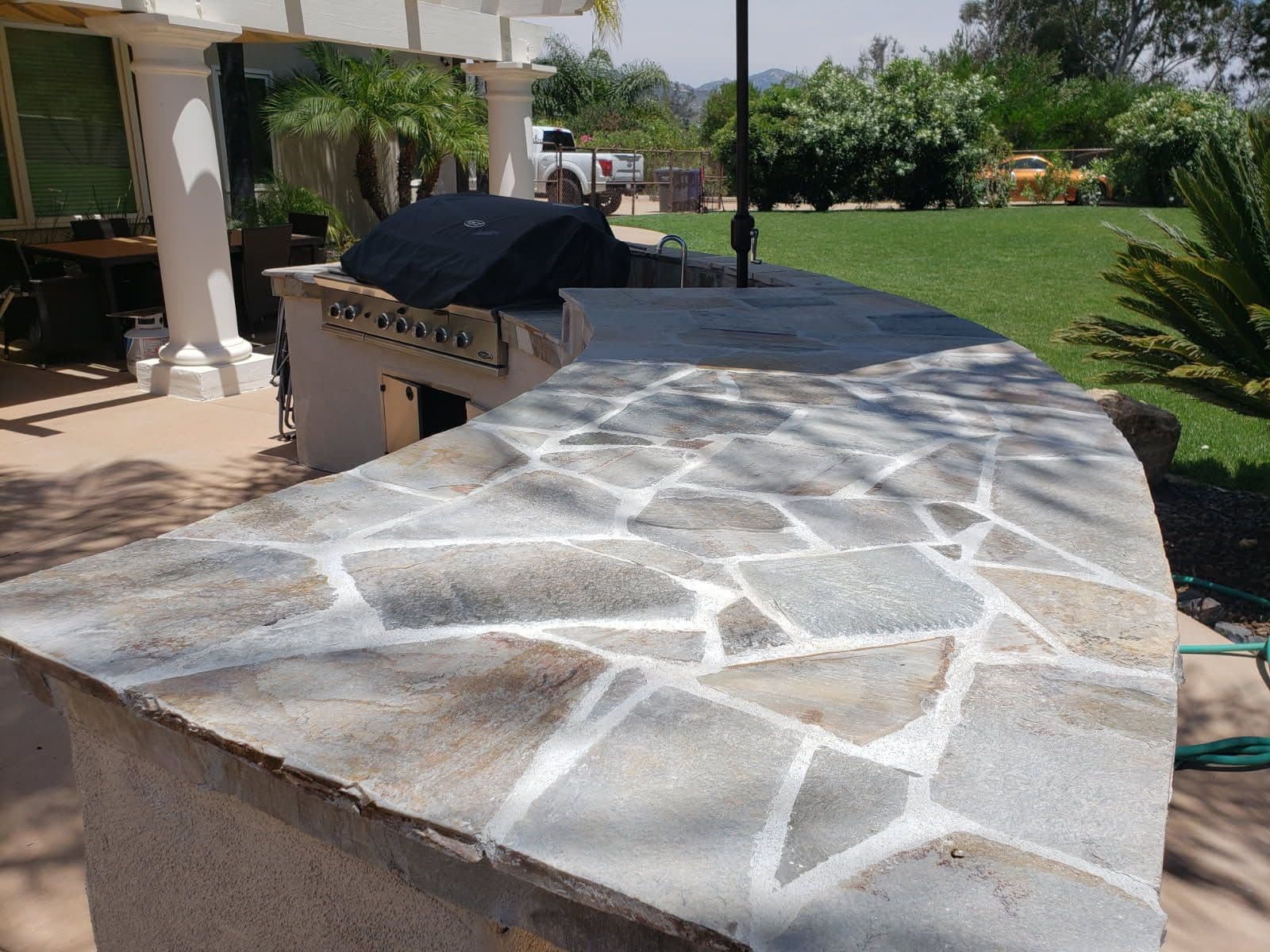 Beautiful Flagstone Outdoor Kitchen Installation image